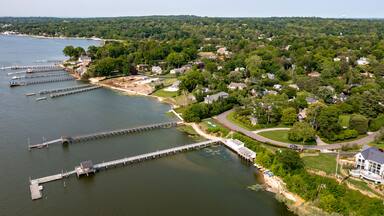 Aerial view, Long Island Coast Plandome, piers manhasset bay drone green