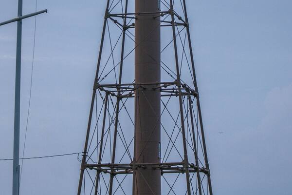 Very unique lighthouse by New England standards. Apparently, the original brick-wood lighthouse was torn down in 1895 and this was erected as a replacement in its place. It's situated in a small park on Marblehead Neck called Chandler Hovey Park. It's worth a visit if you are touring around the north shore of Boston.