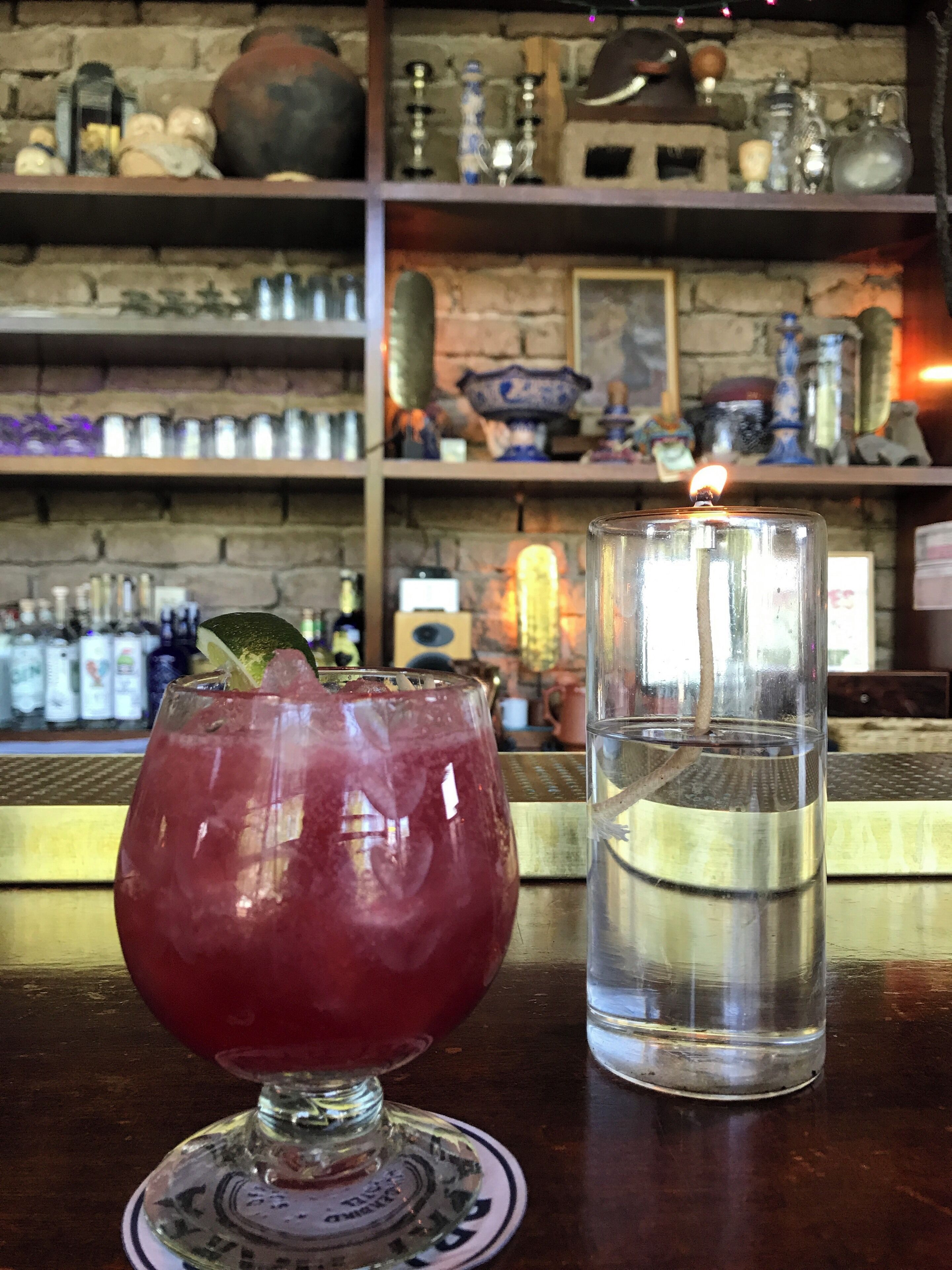 Hibiscus martini in west Texas bar/ resto. Great garden. Cool Tex mex feel.