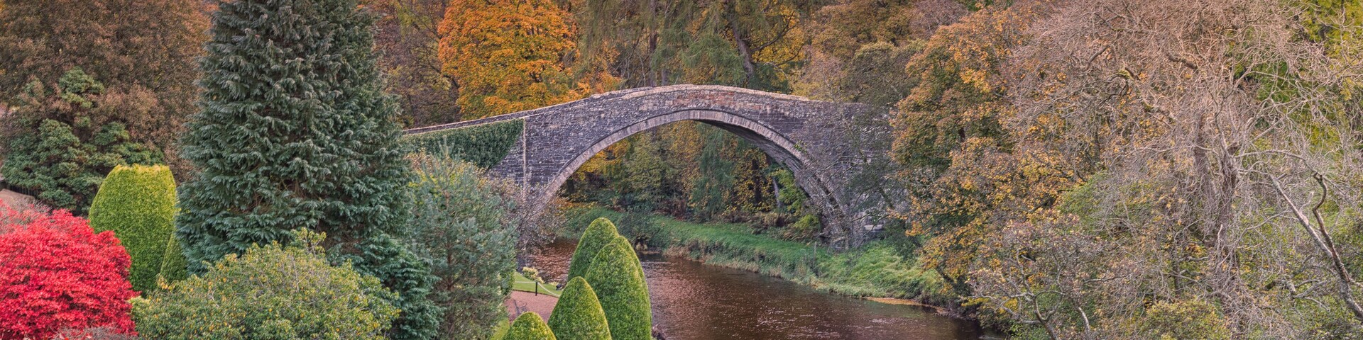 BrigO-Doon and Ayrshire Gardens that Commemorate Burns in Autumn and the Old Brigg at sunset Alloway By Ayr Scotland.