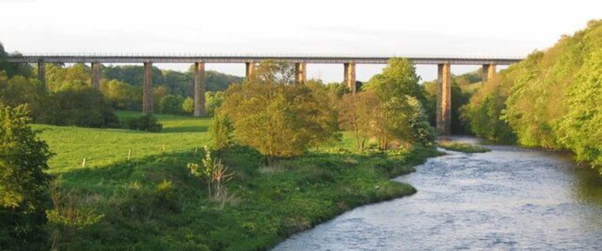 Enterkine Viaduct. A view looking to the northeast along the River Ayr towards the Crawfordston railway viaduct.