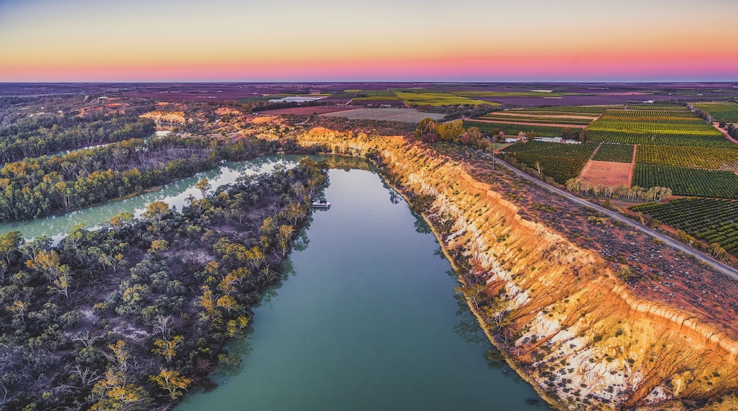 Aerial panorama of eroding sandstone shore of Murray RIver at sunset