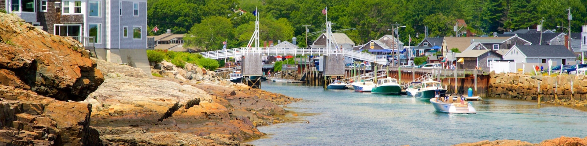 Ogunquit showing rugged coastline, a small town or village and general coastal views