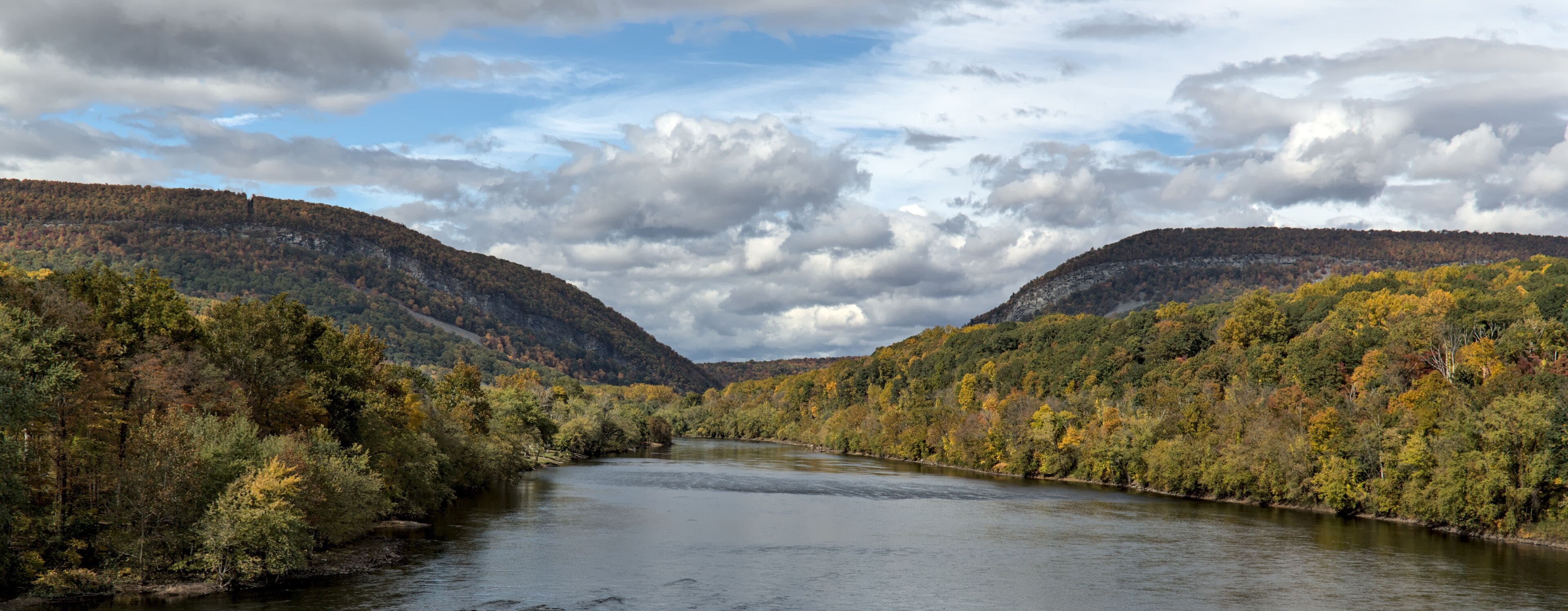 delaware water gap view from viaduct  (autumn with fall colors, trees changing) beautiful landscape Pennsylvania and new jersey border (river, sky, trees, mountains) travel, hiking, walking, scenic