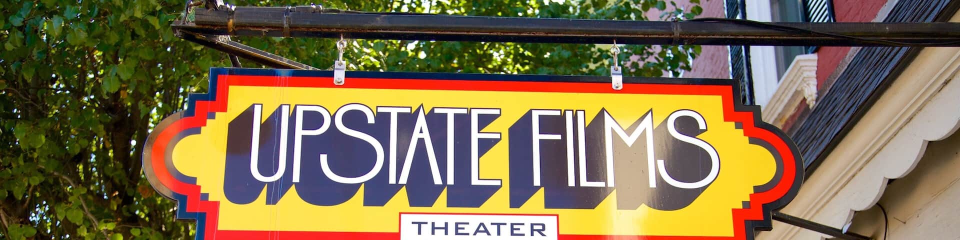 Rhinebeck showing signage and a city