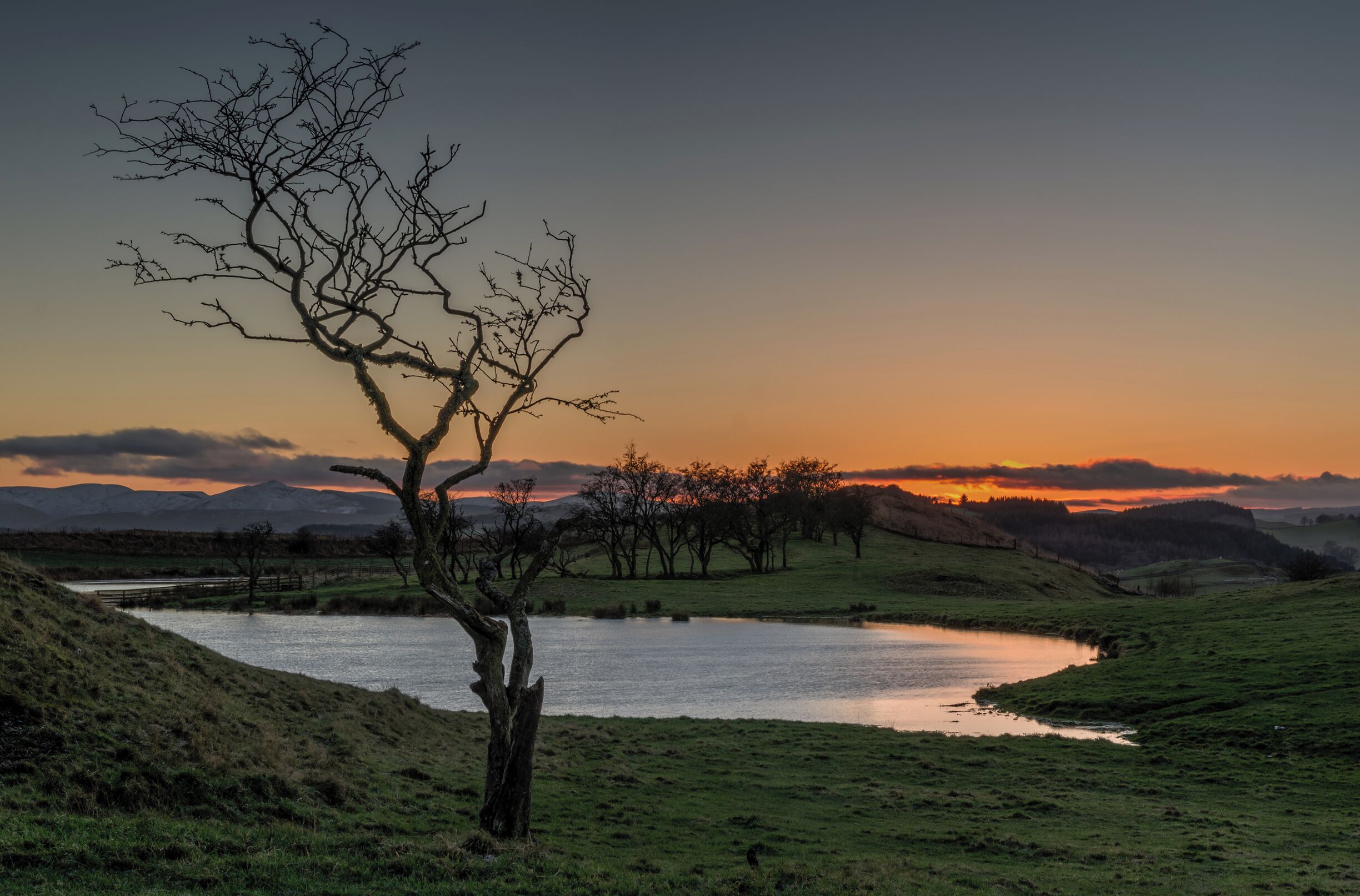 Sunset on a small.pond near Hawick Scottish Borders