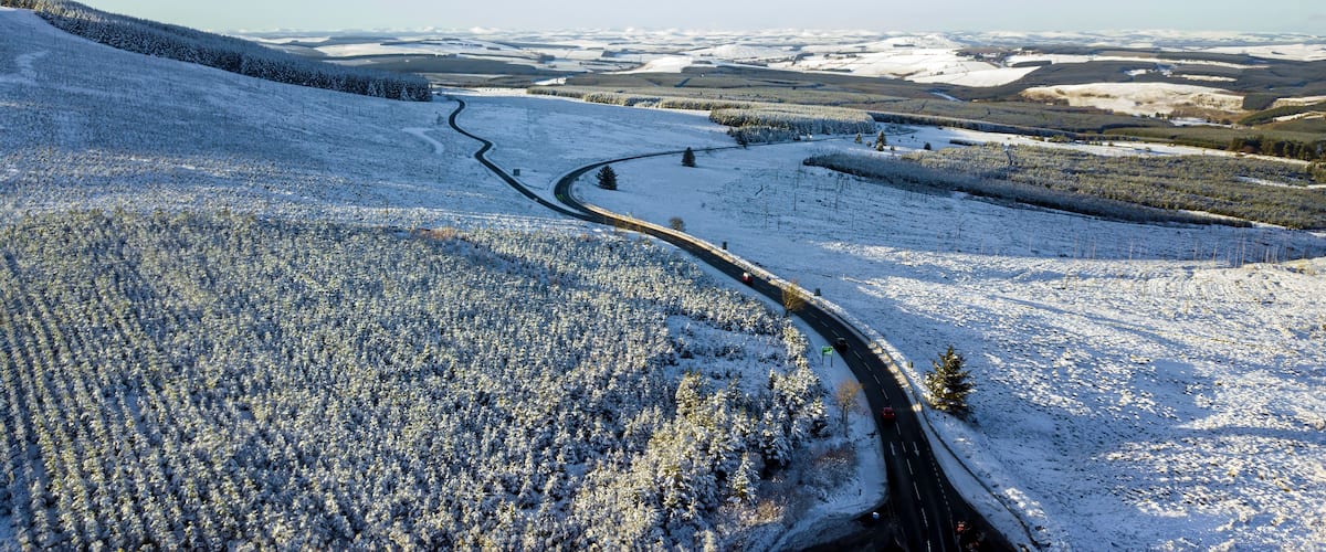 Aerial view of snowy landscape, Hawick, Scotland.