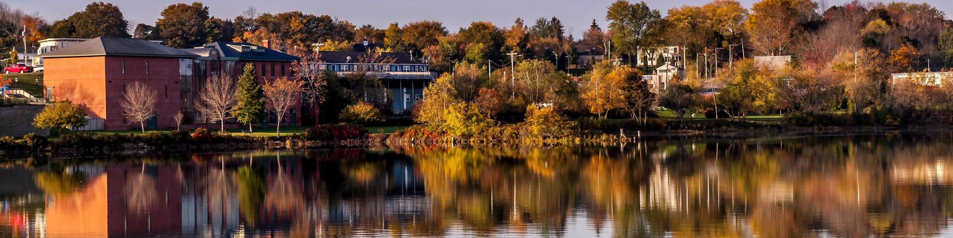 Autumn Colors in CalaIs, Maine USA - photo taken from New Brunswick, Canada side of St Croix river.