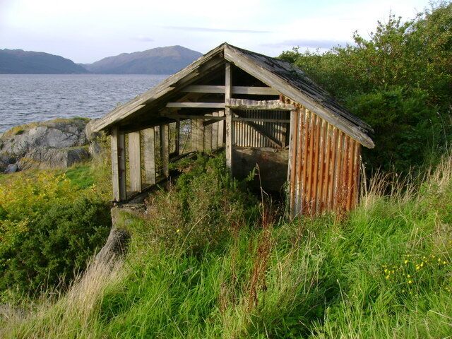 Derelict shed This derelict shed is nestled below Shore Road on the shore of Loch Long. It is unclear whether it was formerly used for gardening or marine purposes.