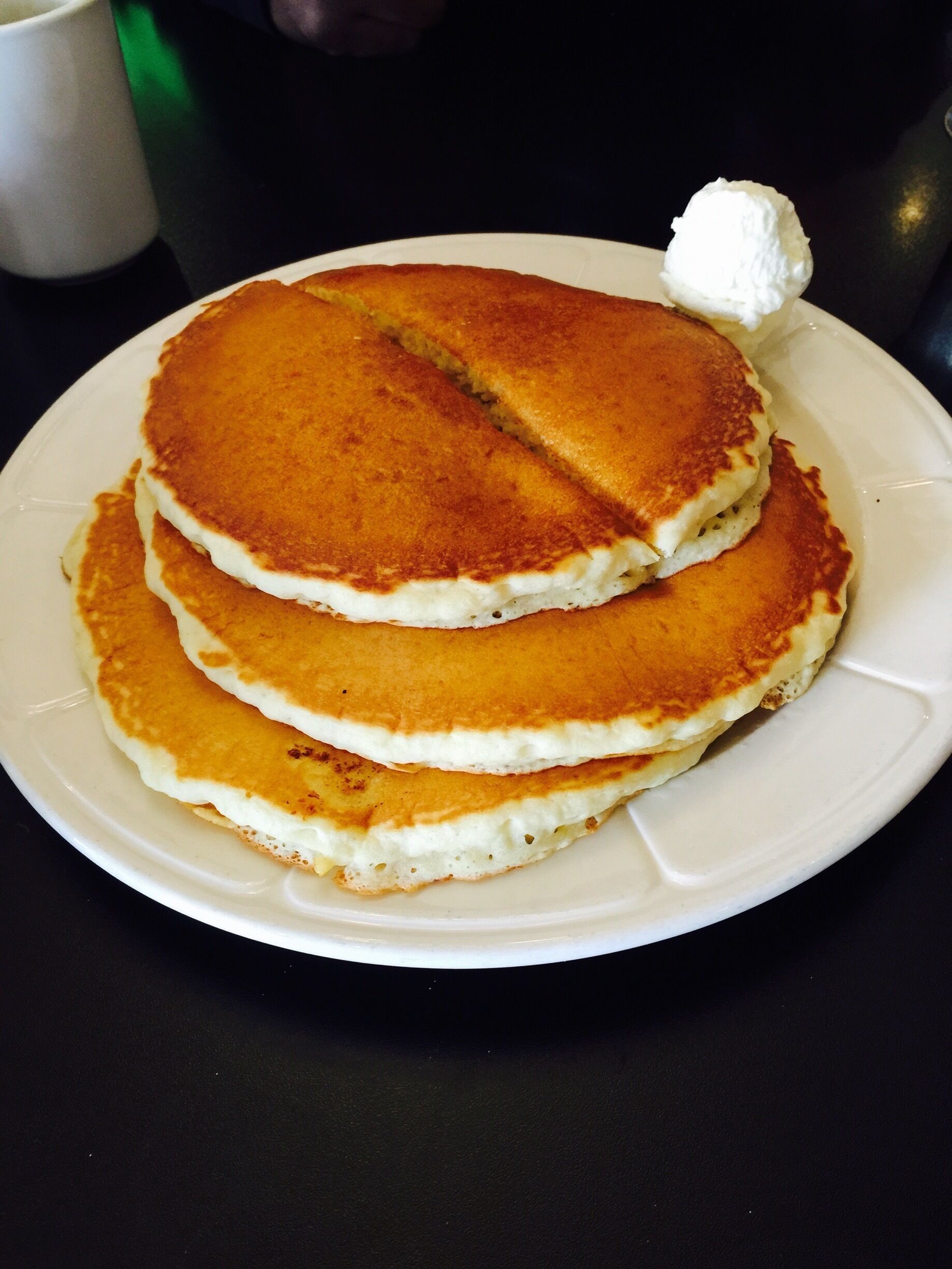 Buttermilk pancake stack at Elios Family Restaurant in San Leandro, the restaurant looks dated from outside but inside is completely remodeled, nice simple and truly American decor. #Delicious 