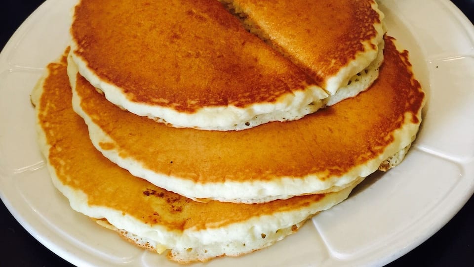 Buttermilk pancake stack at Elios Family Restaurant in San Leandro, the restaurant looks dated from outside but inside is completely remodeled, nice simple and truly American decor. #Delicious