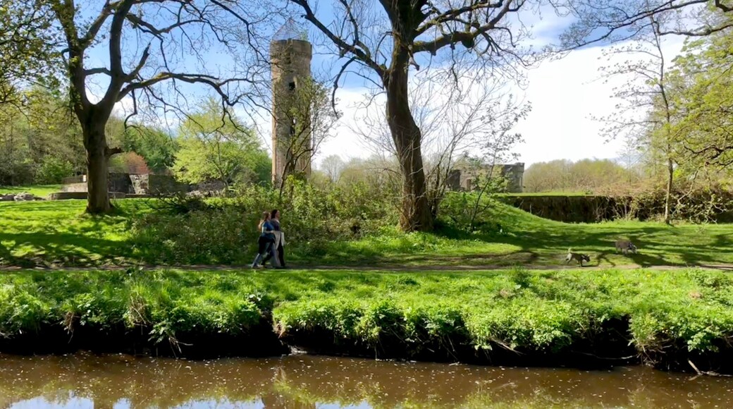 View across the Lugton Water to the ruins of Eglinton Castle in Eglinton Country Park