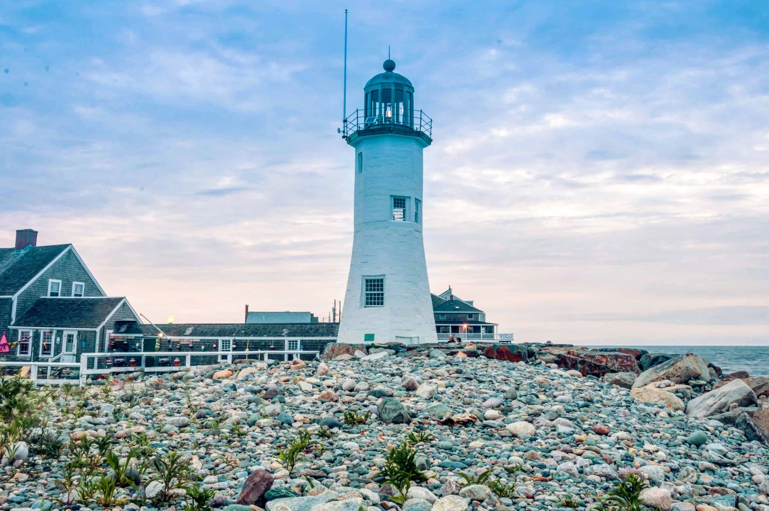 Scituate, a small New England suburb close to #Boston is quite the spot to observe local Sunday life. Weekend homes dot the road to the lighthouse, children play games on the beach and seniors, dog walkers and couples head to the rocky boardwalk for evening strolls. We intended to capture the sunset that particular evening, but the clouds decided to cloak the sky. Nonetheless, we managed to find some thoughtful quotes on stones next to the lighthouse.