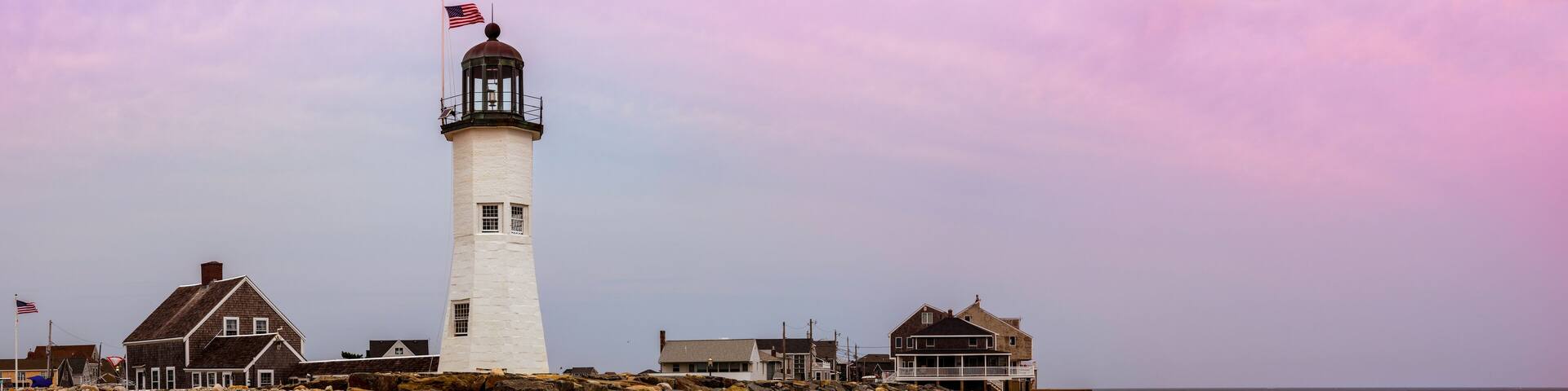Scituate Lighthouse in Scituate, Massachusetts. Historic Landmark Navigational Facility in America. Panoramic Twilight Seascape with Space for Text and Design.