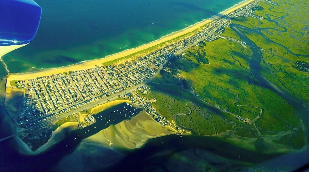 Gre up on this beach every summer, Markey's and Browns are in the Marsh to the bottom right. Cape Air Flight from Boston to Augusta. Beautiful coastal flight.
Markey's and Browns are know for their fried clams, steamers, lobsters and fried haddock. Both places are great, one would think they compete, I worked at Markey's when I was younger, they don't. No one place could handle all the people. The major difference is Markey's serves beer, Browns is BYOB.