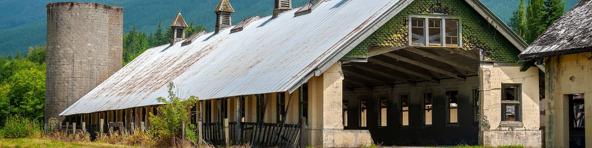 Northern State Recreation Area Old Dairy Barn. Abandoned since 1970, these historic structures were used to feed the patients at an "insane" asylum in western Washington state.