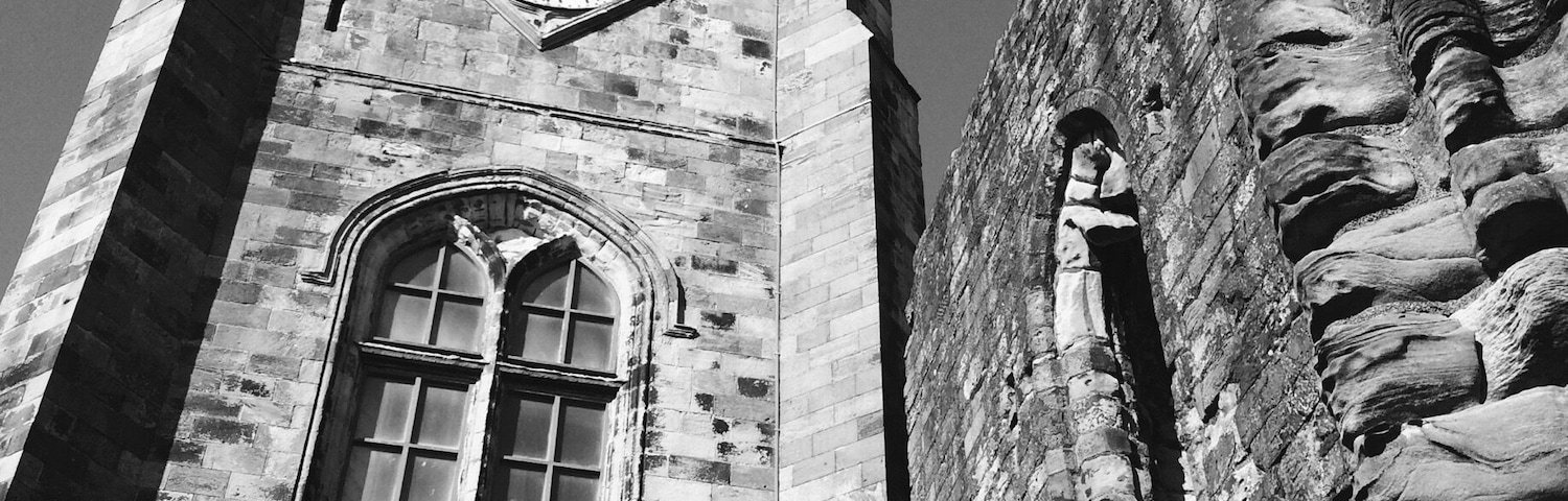 The clock tower looking dark