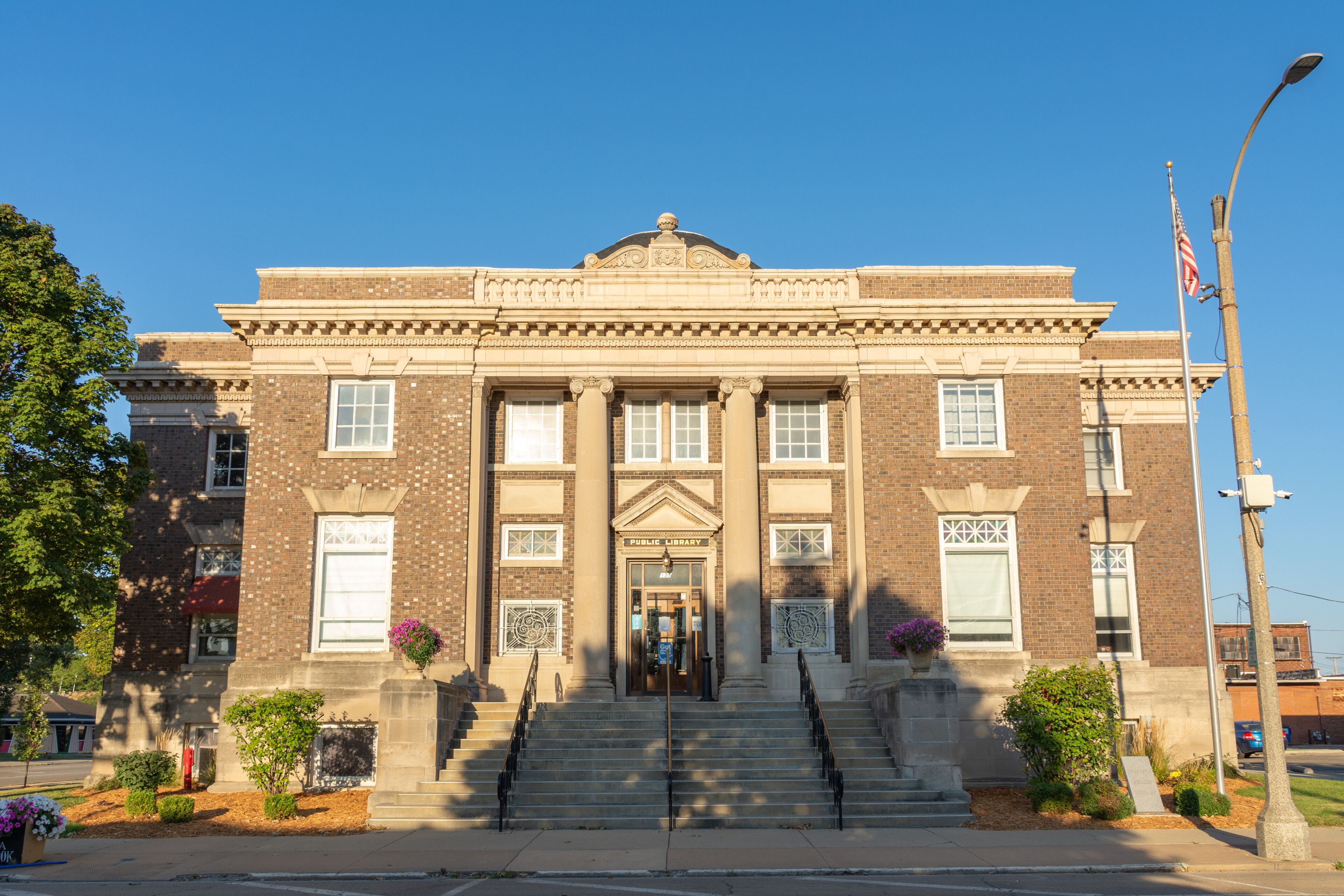 Streator, Illinois, USA - September 16th 2021 - The Streator public library in the morning light.  The Carnegie foundation granted $35,000 towards its construction it opened in January 1903.