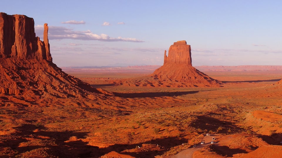 A desert landscape with prominent rock formations.