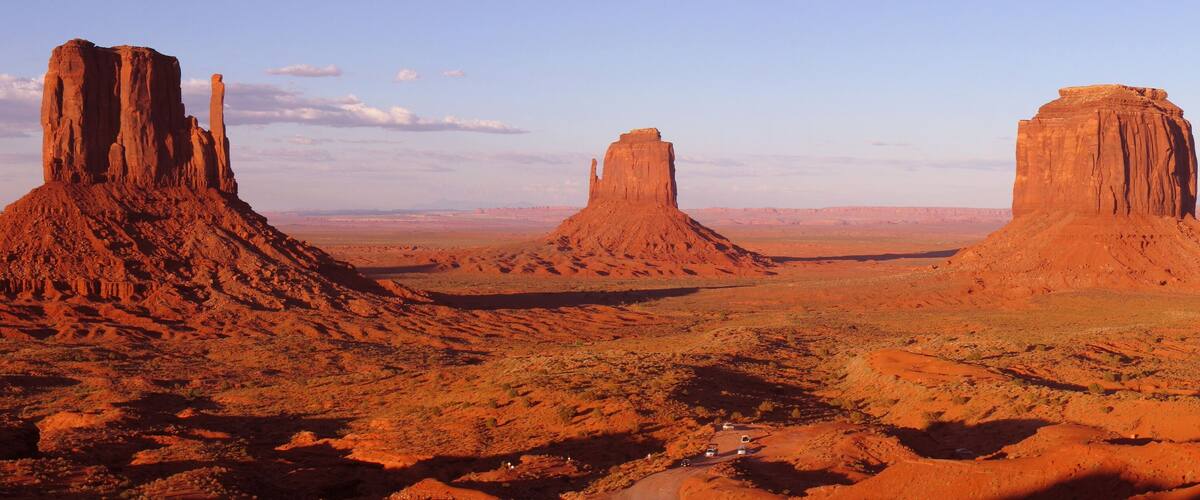 A desert landscape with prominent rock formations.