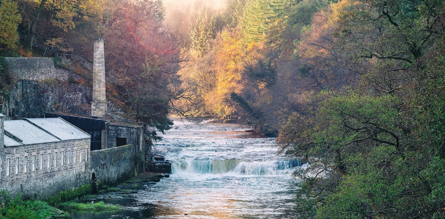 Dundaff Linn, the lowes of the Falls of Clyde as seen from New Lanark at sunrise. Scotland, UK