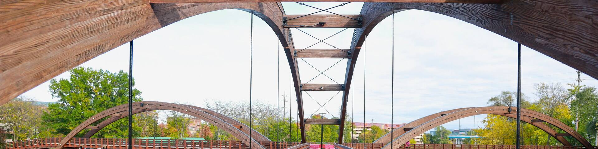Midland's three-way 'Tridge' on a bright summer day is the symmetrical intersection of three elevated walkways on a recreation trail.