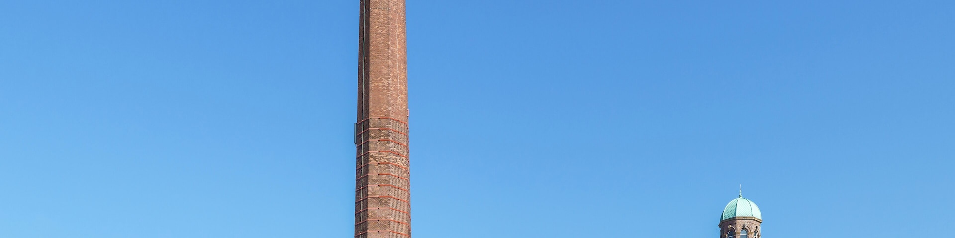 Mile End Mill in Paisley. The old boiler-room chimney is 73.7m (242ft) tall.