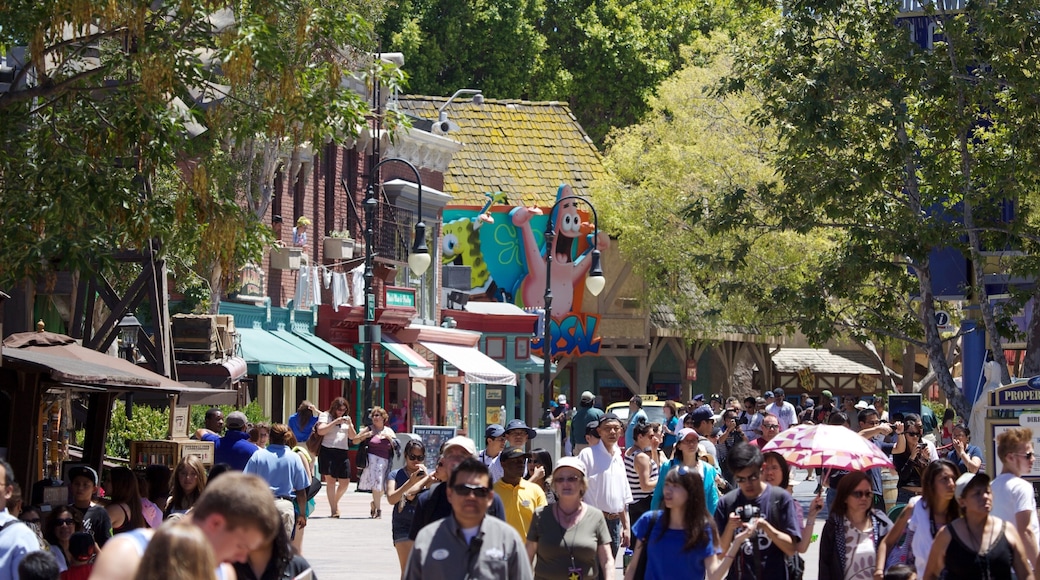 Crowds enjoy a vibrant day at Universal City in California, showcasing attractions and lively street activity