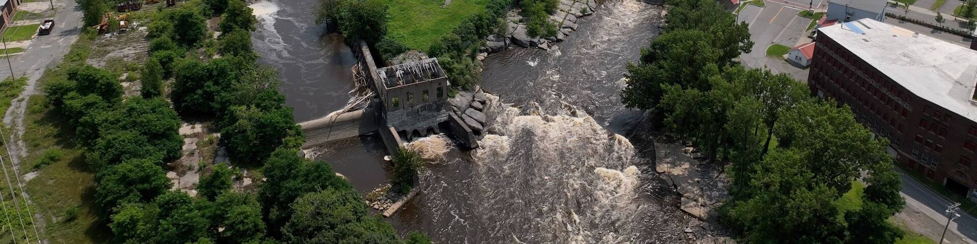 Old abandoned ruin architecture of mill dam on the Black River in Watertown, NY