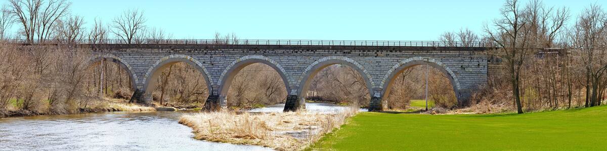 Historic Union Pacific railroad stone arch bridge over Turtle Creek Wisconsin