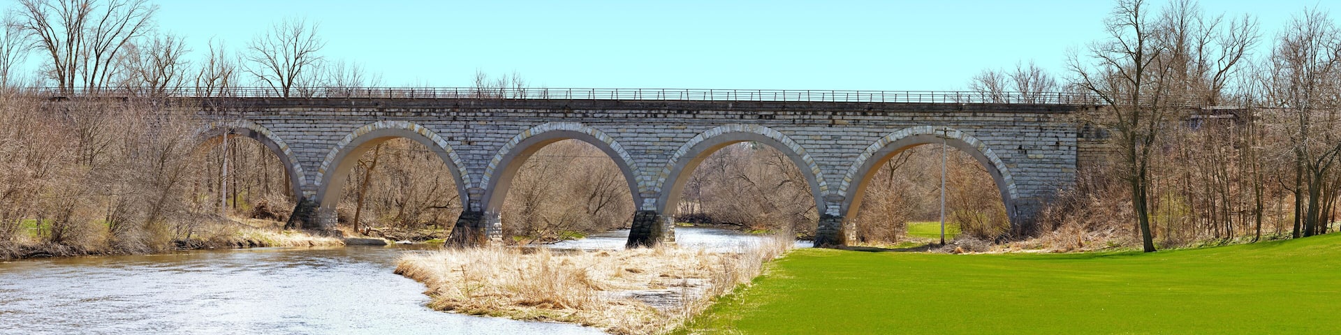 Historic Union Pacific railroad stone arch bridge over Turtle Creek Wisconsin