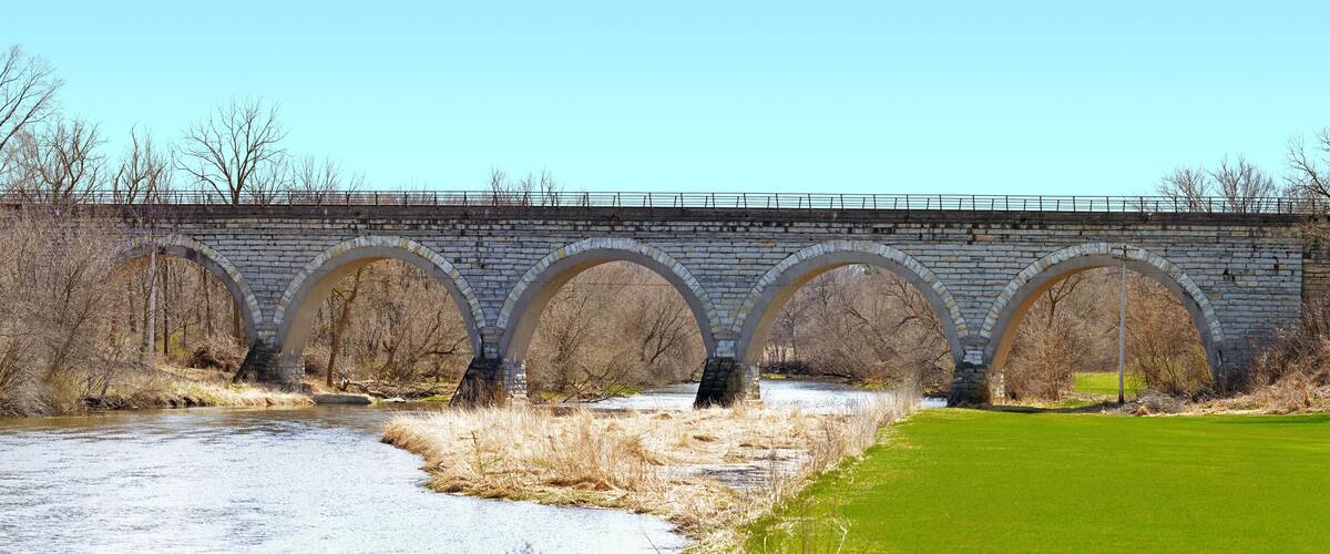 Historic Union Pacific railroad stone arch bridge over Turtle Creek Wisconsin
