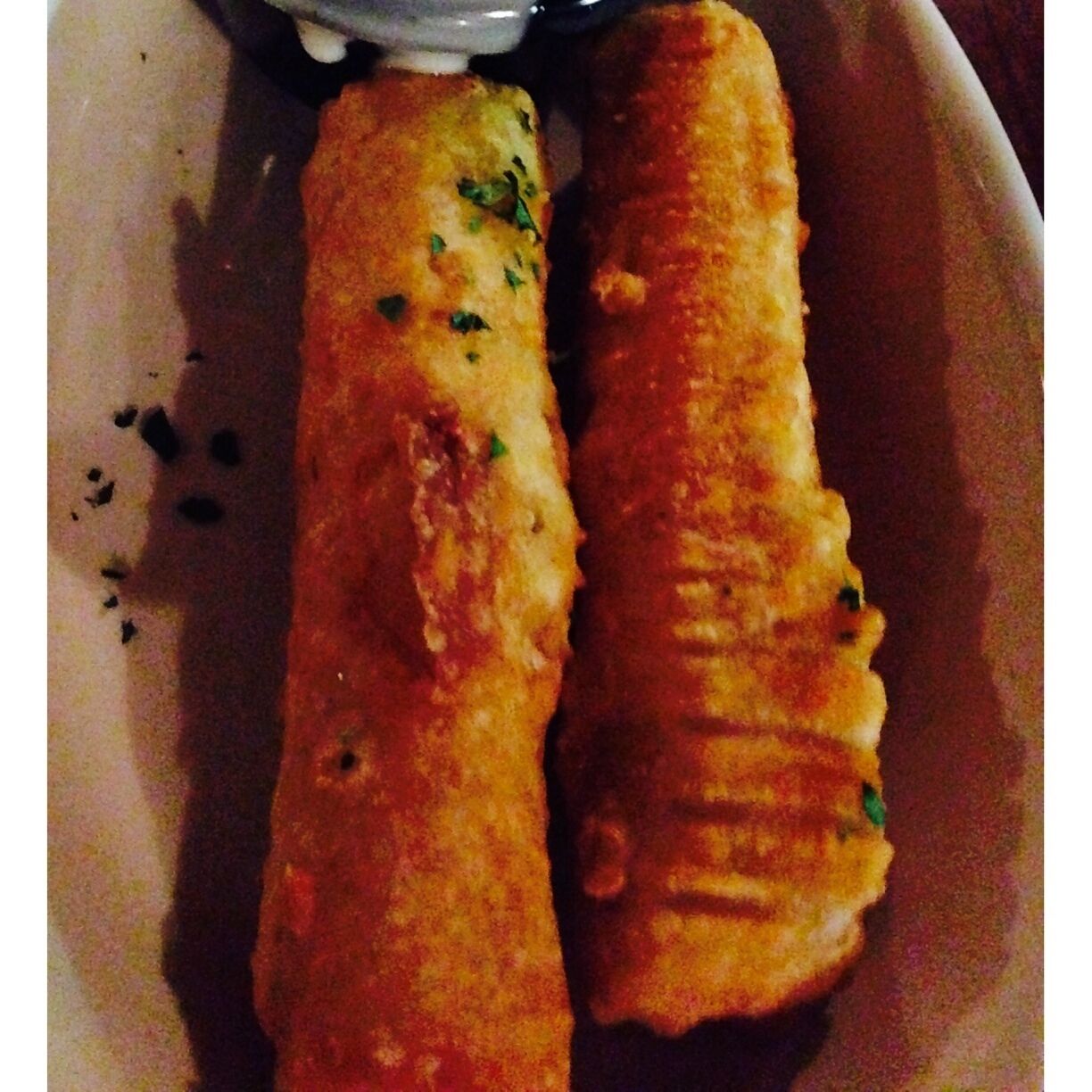 Giant fried mozzarella sticks.   "#delicious"