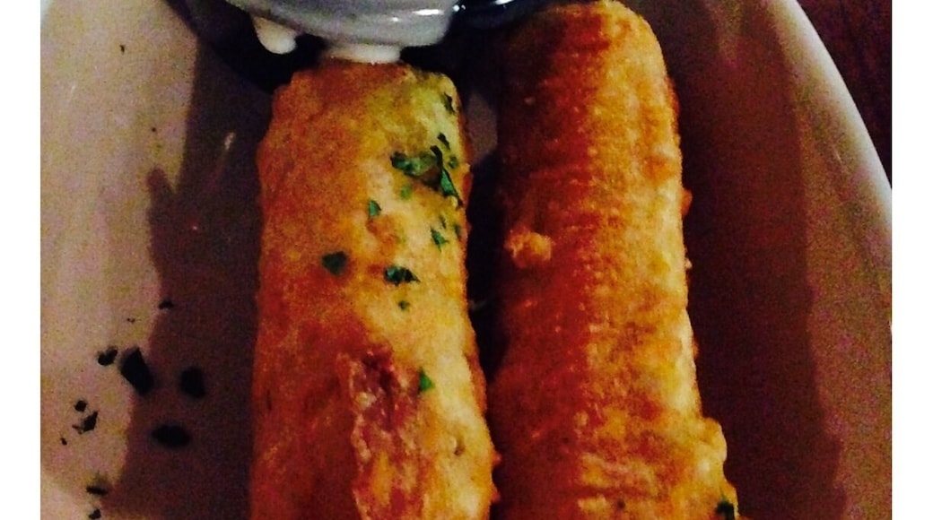 Giant fried mozzarella sticks. "#delicious"