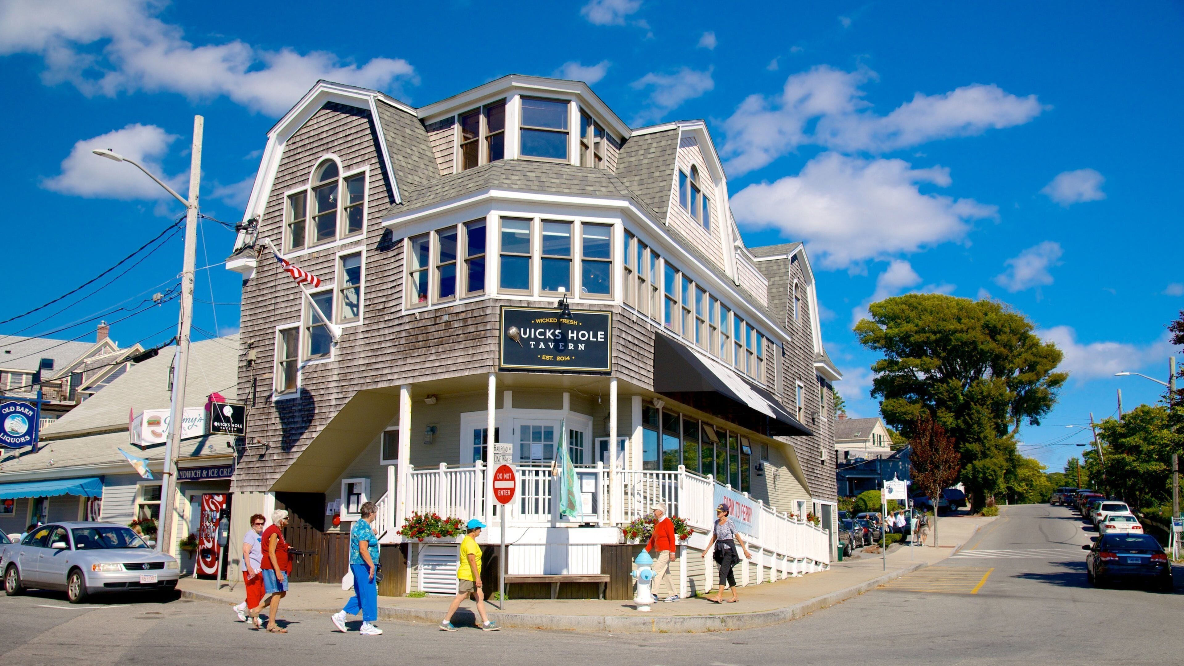 A corner building with a sign reading "Wicked Fresh Tavern".
