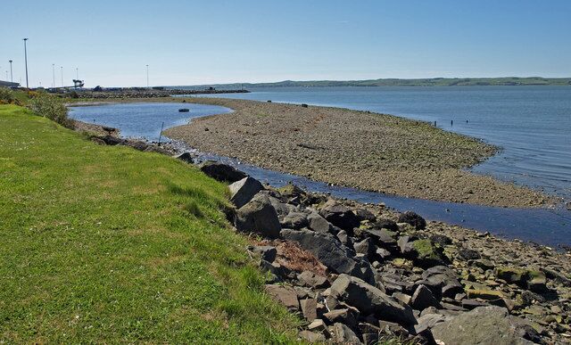 Claddy House Burn This burn passes under a car park to emerge and meet Loch Ryan. The shingle bank prolongs its course.