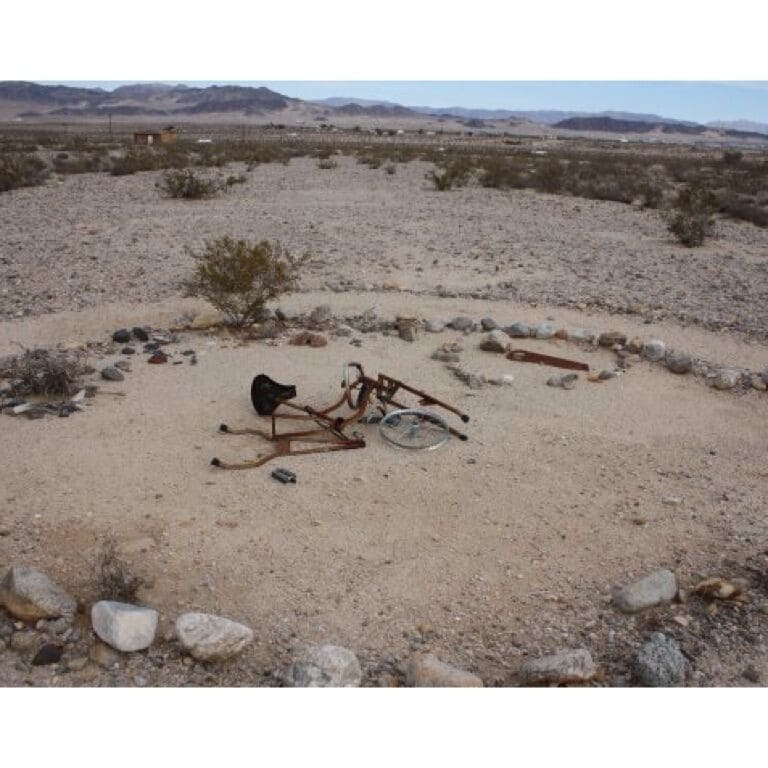 Take the second left past yucca bowl and find this odd discovery! Looks like a bicycle sacrifice. Near high noon road behind the old sheds