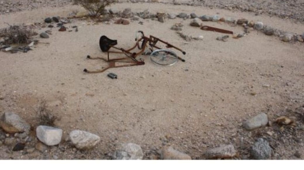 Take the second left past yucca bowl and find this odd discovery! Looks like a bicycle sacrifice. Near high noon road behind the old sheds