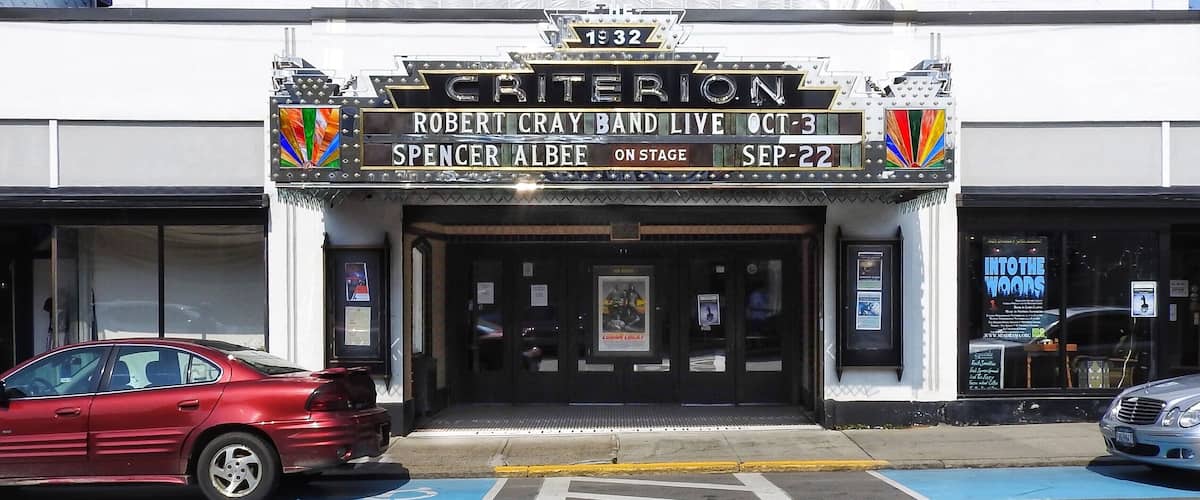 The Criterion in downtown Bar Harbor, Maine, does not look very much from the exterior, but it is a glorious, well-preserved Art Deco style theatre. Opening in 1932, it has served the town of Bar Harbor as a movie palace ever since, accomodating such prominent families as the Rockefellers on their vacations to nearby Mount Desert Island.
Kept in fantastic condition over the years, the theatre still has most of its original interior: seats, curtains, and even the original lighting board for stage performances. The Criterion Theatre also contains a floating balcony, which is rare for most movie palaces. Click on the following link to see a photo of the interior:
https://www.criteriontheatre.org/
#History