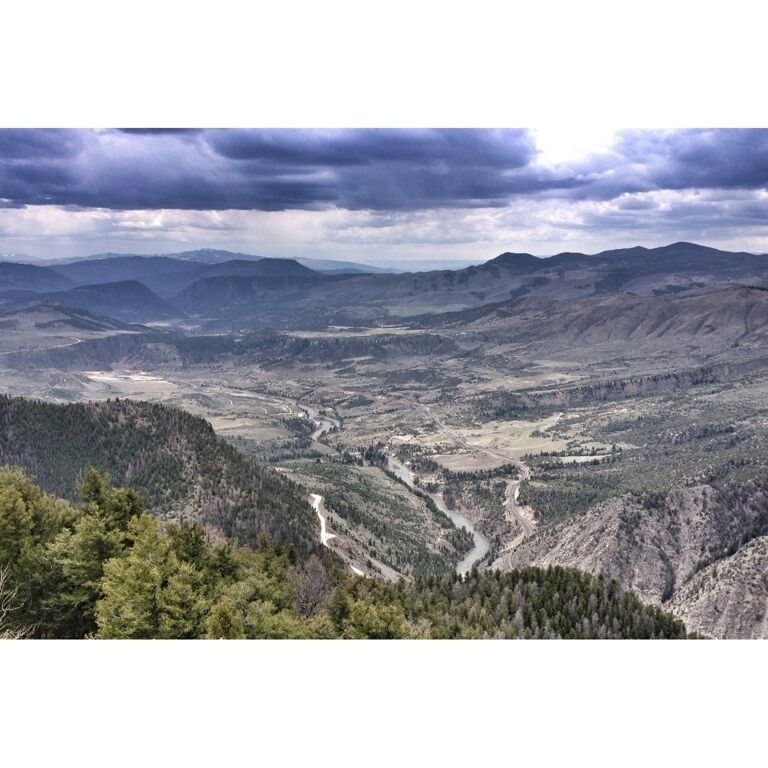 If you can manage to find your way up to this point, there's an incredible view! The man that owns this property is Mr. Yost. He owns a couple school buses if you're looking for the correct house... Also, don't even attempt this journey without a 4x4. :)