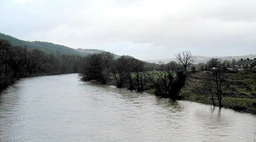 The River Wye in full spate Viewed from the road bridge at Llyswen