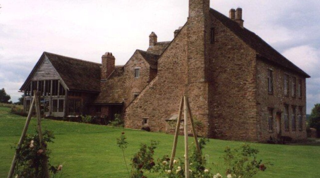 Tredustan Court, Talgarth. A large house with an eye-catching wooden shed behind.
