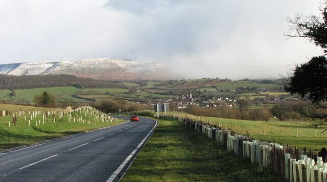 The new bypass at Bronllys View across Talgarth towards the Black Mountains. A snow flurry passes over and hides the mountains.