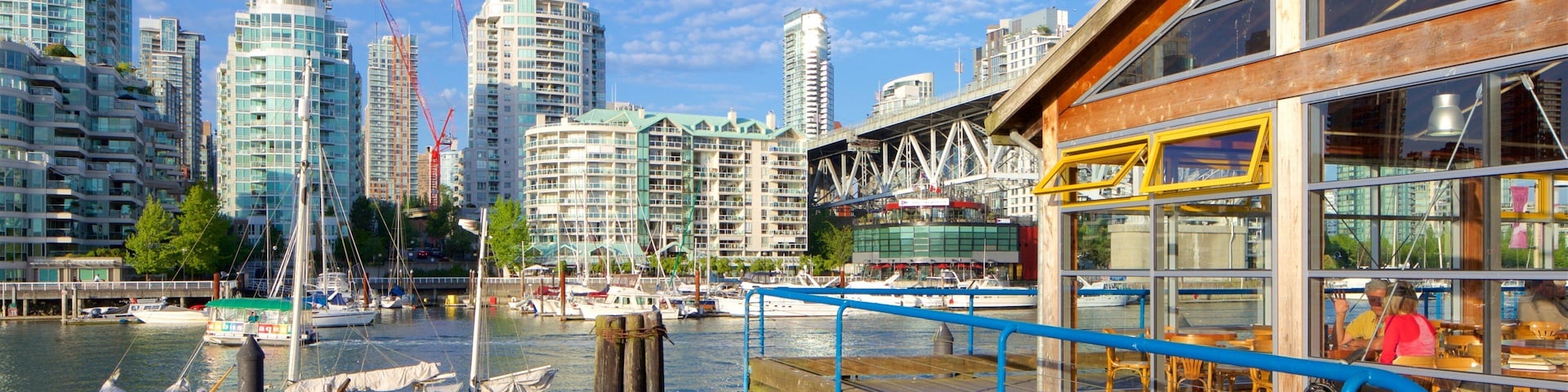 Granville Island showing a city, a bay or harbor and a river or creek