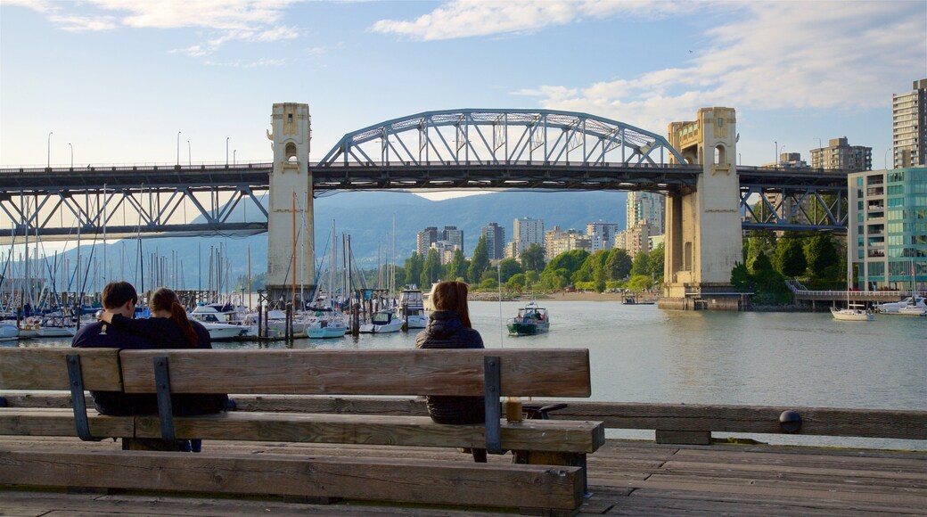 Granville Island which includes a river or creek, a bridge and a bay or harbour