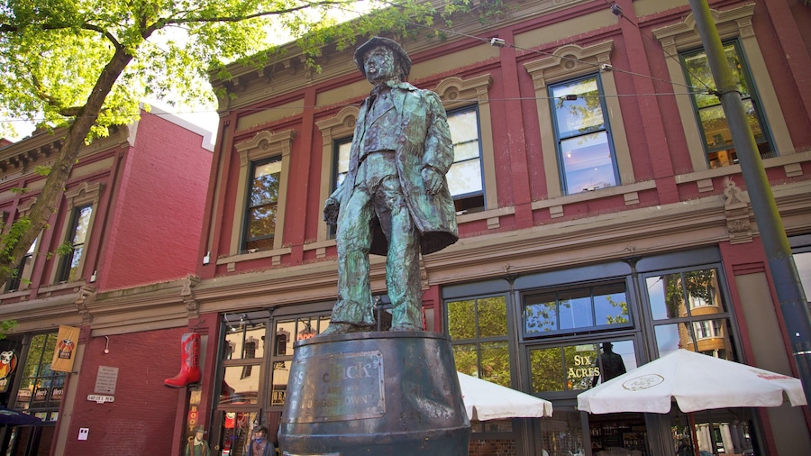 Gastown showing a city, outdoor art and a statue or sculpture