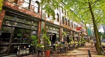 Bustling atmosphere of Gastown with cafes and greenery in Vancouver, British Columbia in summer