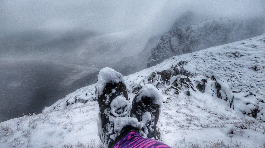 Very snowy boots overlooking Cwm Silyn