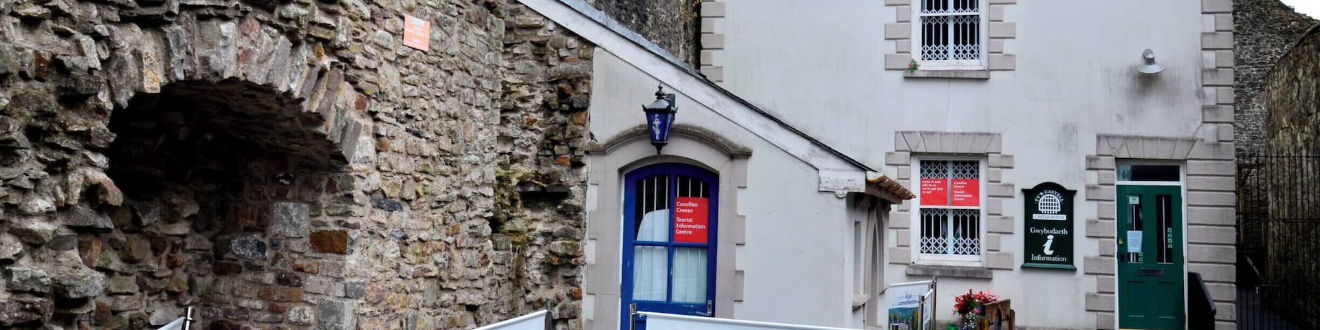 Carmarthen Castle is a ruined castle in Carmarthen, West Wales, UK. First built by Walter, Sheriff of Gloucester in the early 1100s, the castle was captured and destroyed on several occasions before being rebuilt in stone during the 1190s