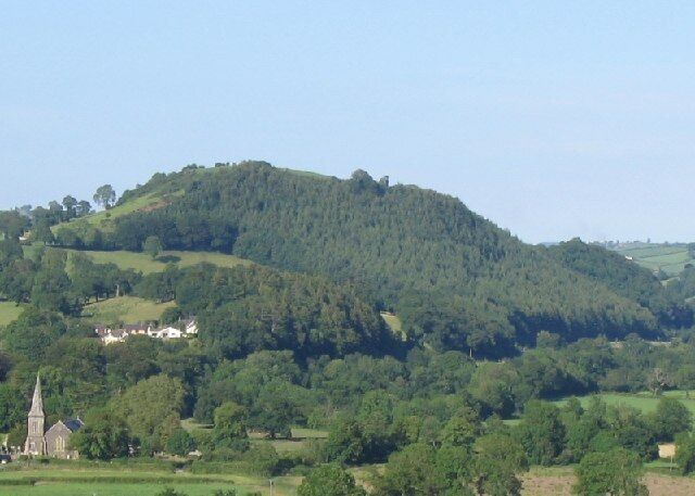 Merlin's Hill near Carmarthen. Rumours of Merlin persist about Carmarthen. Many believe the Welsh name of the town "Caer Myrddin" means the Fort of Merlin. In fact the name derives from Caer Moridunum - the fortress near the sea. However, this hill is called Merlin's Hill, and the map says there was a fort on it.